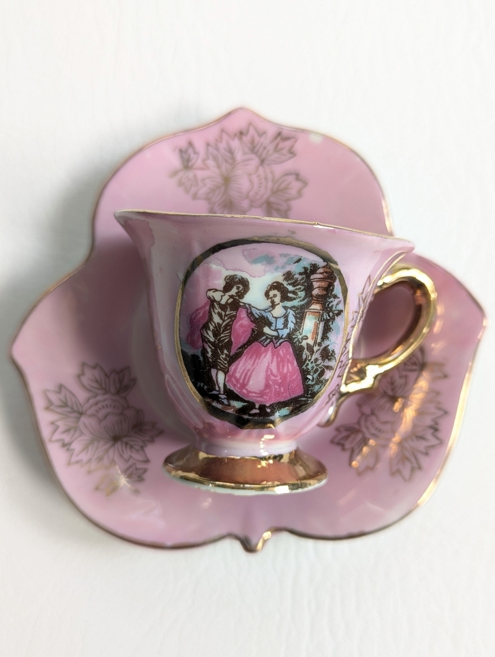 Vintage Royal Crown Porcelain Teacup & Saucer Courting Couple Pink Iridescent
